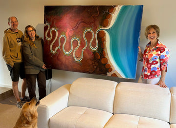 Tania Chanter delivering her painting to a first time collector