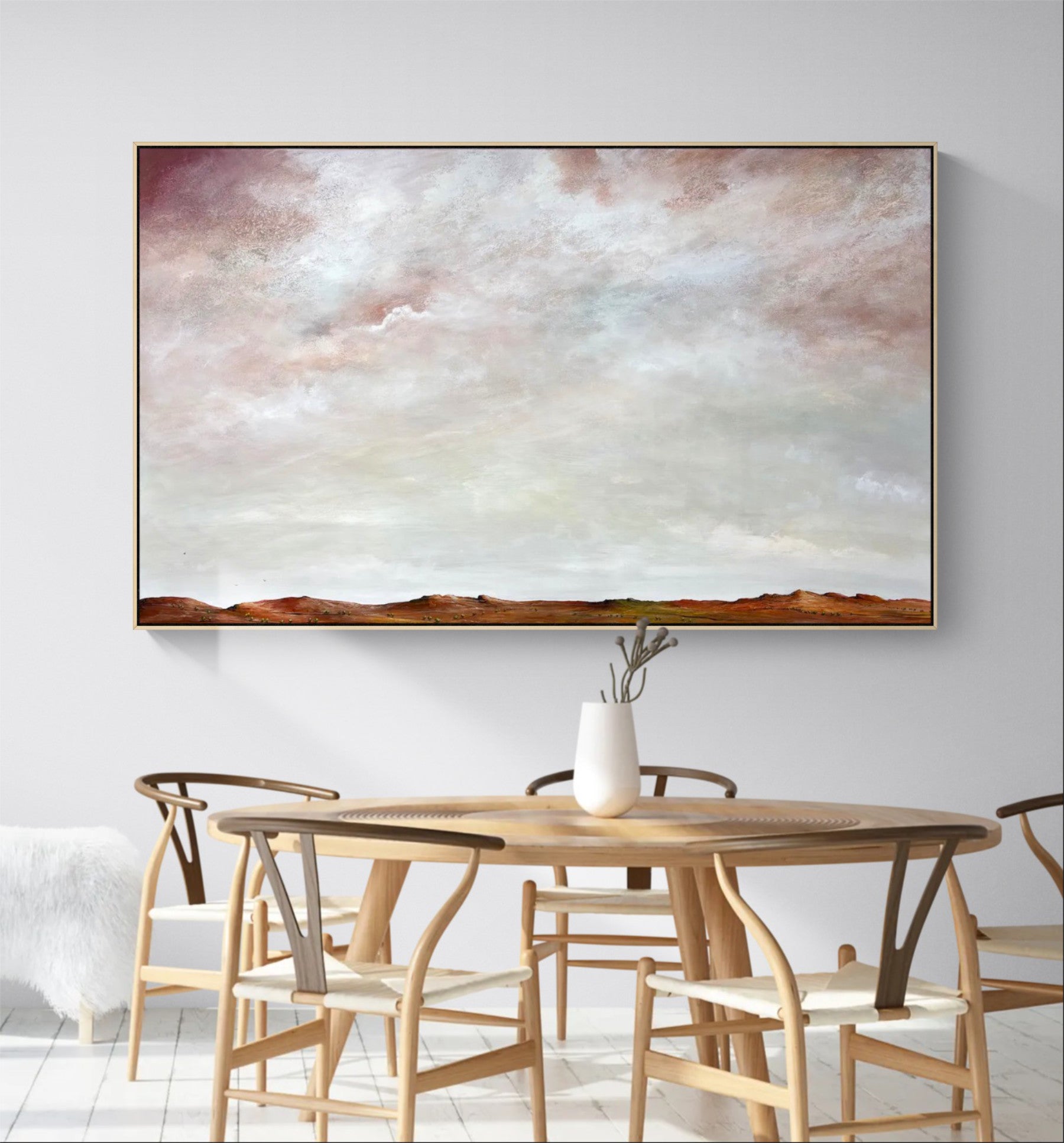 The Light of Summer abstract cloudscape painting styled in a contemporary interior, adding calm tones and natural beauty to the space.