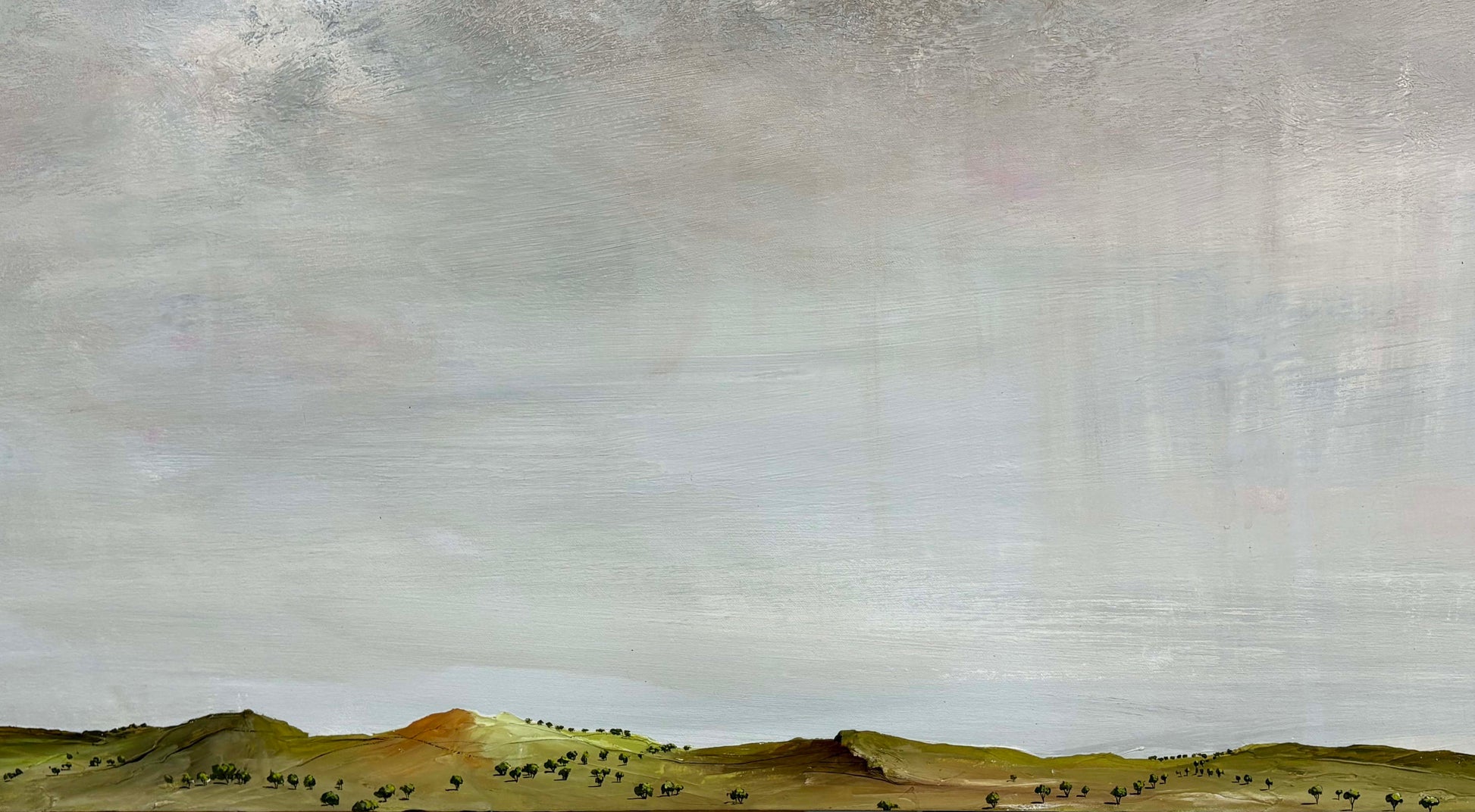 Acrylic on canvas painting of a wide, desolate landscape with rolling green and brown hills under a vast, textured gray sky.